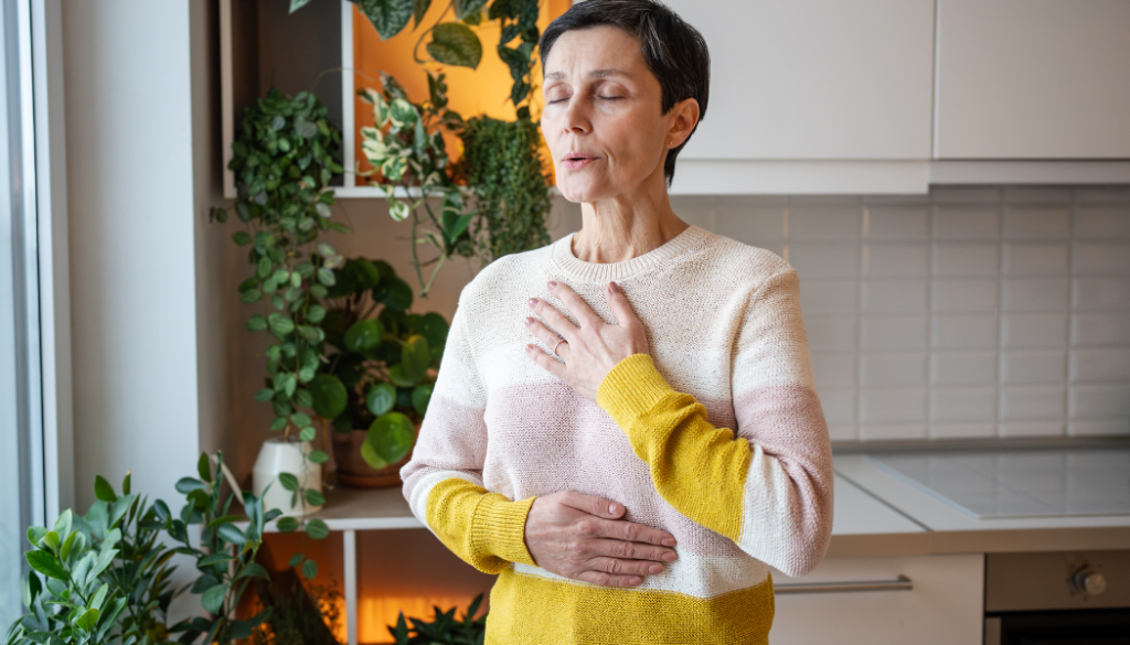 How Trauma Stays in the Body: Why Your Nervous System Remembers What Your Mind Moves Past - Resolutions Therapy A person noticing their own breath and body — somatic awareness as a foundation for trauma recovery